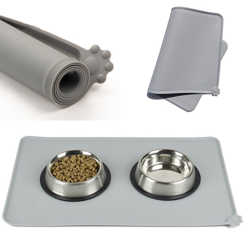 Silicone pet feeding mat under food and water bowls