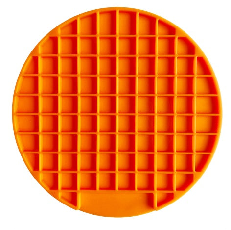 Orange silicone lick mat with a square grid pattern